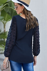 Dotted v neck blouse