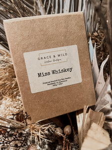 Miss whiskey candle